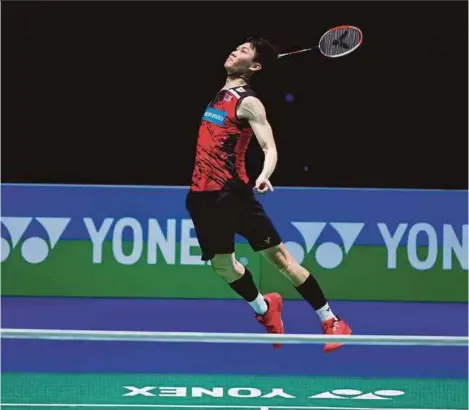  ?? AFP PIC ?? Lee Zii Jia returns against Viktor Axelsen during the All England men’s singles final in Birmingham, England, on Sunday.
