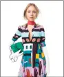  ??  ?? ON THE COVER Dress, $7,300, Valentino, The Shops at Crystals; double- georgette scarf, $1,200, Tom Ford, The Shops at Crystals; white fingerless leather long gloves, $725, Gucci, The Shops at Crystals; Leigh small top handle cross body bag with chain,...