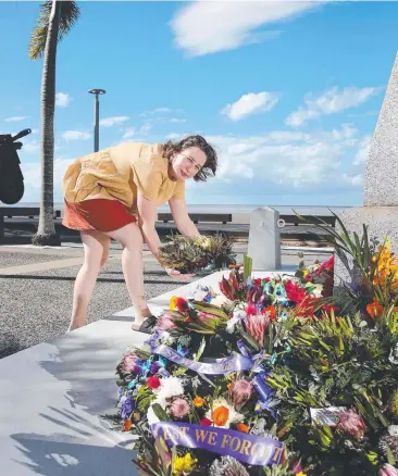  ?? Pictures: BRENDAN RADKE ?? REMEMBERIN­G THEM: Bronte Nargar from Kuranda lays a wreath at the cenotaph to honour Australian and New Zealand soldiers, despite there being no services due to the coronaviru­s.