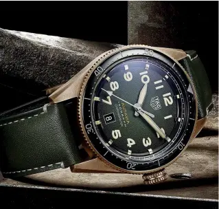  ??  ?? CASE SIZE: 42MM
CASE MATERIAL: BRONZE
DIAL: SMOKED GREEN OR BROWN DIAL STRAP: BROWN OR KHAKI- COLORED LEATHER STRAP
MOVEMENT: AUTOMATIC CALIBRE 5 POWER RESERVE: 38 HOURS
WATER RESISTANCE: 100M