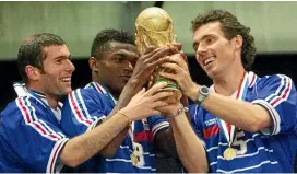  ?? AP ?? Flashback: French players (from left) Zinedine Zidane, Marcel Desailly and Laurent Blanc hold the World Cup after France beat Brazil 3-0 in the 1988 final in France.