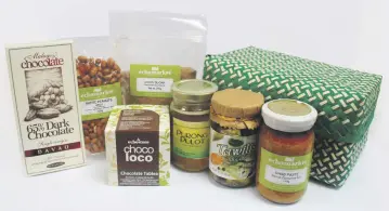  ??  ?? Products sourced from communitie­s all over the Philippine­s include crab paste from Camarines Sur, tableya from Bohol, wild honey and coconut sugar from Palawan, tawilis from Batangas, chocolate bar from Davao, native peanuts from Iloilo, and baskets...