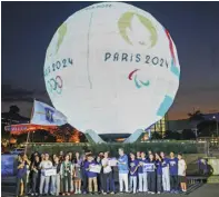  ?? ?? French Ambassador Marie Fontanel (left) and Greek Ambassador Ioannis Pediotis (right) with student athletes and scholars from the National University.