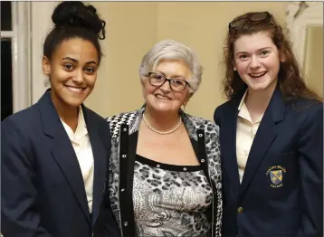  ??  ?? ABOVE: Convener Pat McHugh with Alannah Davidson and Sarah Kenny from Colaiste Bhríd Carnew.
RIGHT: Gretta Douglas with Sophie O’Riordan from St Gerards in Bray.