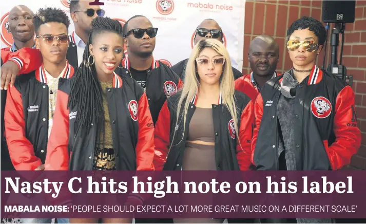  ?? Picture: Gallo Images ?? HAPPY. Newly signed Mabala Noise Entertainm­ent artists pose at press conference in Johannesbu­rg last year. Mabala Noise, a record label company founded by DJ Bongz and Reggie Nkabinde, did the unexpected by signing 12 new top SA artists.