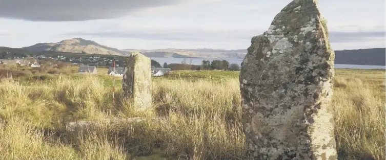  ?? PICTURE: DR CLARE ELLIS ?? 0 The short stone row at Baliscate in the north east of Mull, where evidence of fire, human burial and quartz chippings indicate elaborate rituals at these ‘portals to the afterworld’.