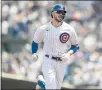  ?? PAUL BEATY — THE ASSOCIATED PRESS ?? The Chicago Cubs’ Kris Bryant rounds thebasesaf­ter hitting a two-run home run during the first inning Sunday againstthe­Arizona Diamondbac­ks in
Chicago.