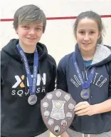  ??  ?? Invincible­s Maddie and Lucy celebrate title win
