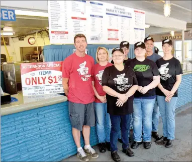  ?? Janelle Jessen/Siloam Sunday ?? Jacob Frese, left, recently purchased Barnett’s Dairyette. He is pictured with a few members of the Barnett’s team, including manager Mel Thomas, Donna Smith, Rachael Harris, Erica Miller, and Mark and Shauna Bernard. The restaurant also celebrated its...