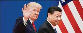  ?? AFP; APA ?? US-Präsident Donald Trump und Chinas Präsident Xi Jinping