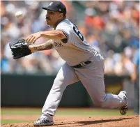  ?? NICK WASS/ AP ?? Yankees starting pitcher Nestor Cortes pitches during the first inning Sunday in Baltimore. He shut out the Orioles for six innings.