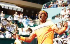  ??  ?? Spain’s Rafael Nadal celebrates after winning the match against Britain’s Andy Murray during the Monte-Carlo ATP Masters Series Tournament semi-final match, on April 16, 2016 in Monaco. Nadal won the match 2-6, 6-4, 6-2. - AFP photo