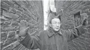  ??  ?? David Chuen-Yan Lai in Fan Tan Alley in 2010, his favorite place in Chinatown because of its historical significan­ce. The noted scholar of Chinese culture in B.C. died June 15.