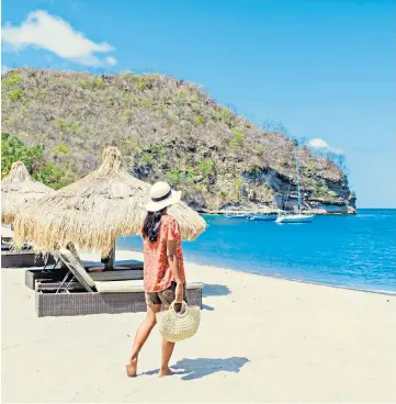  ?? ?? g Calm before the storm: soak up some winter sun in St Lucia before the busy Christmas season begins…
h… or meet the festive season head-on with a Santa Adventure in Swedish Lapland