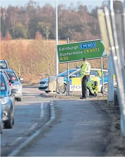  ?? Picture: David Wardie ?? A police officer was airlifted to Ninewells Hospital following the crash on the A92 between Crossgates and Cowdenbeat­h.