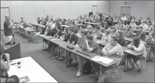  ?? The Sentinel-Record/Richard Rasmussen ?? FUN FOR ALL AGES: Derek Horn, a public television director from Annapolis, Md., spoke to student filmmakers from across the state Monday at the Hot Springs Convention Center. The Arkansas Educationa­l Television Network partnered with the Hot Springs...