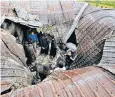  ??  ?? The remains of Zakir Musa’s hideout after a gun battle with Indian security forces