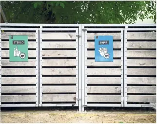  ??  ?? Waste and compost containers are protected by cages in villages close to bear habitats in Slovenia to prevent the animals from foraging for food in human spaces.