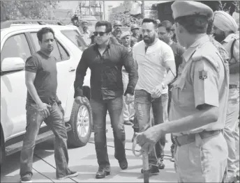  ??  ?? Bollywood actor Salman Khan (2nd L) arrives at a court in Jodhpur in the western state of Rajasthan, India, April 5, 2018. REUTERS/Stringer. “