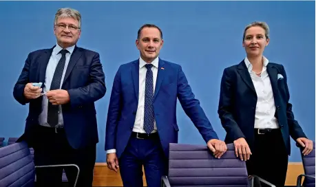  ?? AFP ?? Leaders of Germany’s Alternativ­e for Germany (AFD) party — Alice Weidel, Tino Chrupalla and Joerg Meuthen — at a press conference in Berlin on September 27, 2021, a day after general elections. —