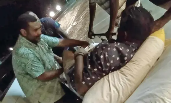  ?? ?? From left: Fiji Red Cross Society Northern Division manager, Mitieli Duvuloco, assisted the bus driver, who was involved in a motor vehicle accident at Tabia, Labasa on April 18, 2023.