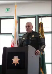  ?? ?? Butte County Sheriff Kory Honea speaks at a lectern Friday at a memorial service at the Butte County Sheriff’s Office.