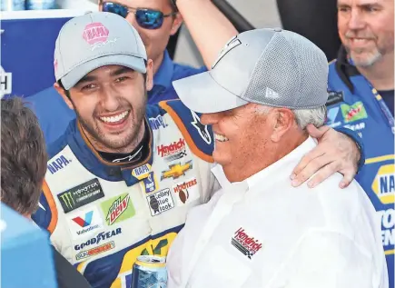  ?? MATTHEW O’HAREN/USA TODAY SPORTS ?? Chase Elliott is congratula­ted by owner Rick Hendrick in victory lane after the Gander Outdoors 400 Sunday at Dover Internatio­nal Speedway for his second Monster Energy NASCAR Cup Series win.