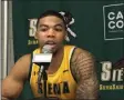  ?? THE ASSOCIATED PRESS ?? Siena forward Elijah Burns, a transfer from Notre Dame, speaks Wednesday night after scoring 24 points and snaring 10 rebounds in a 77-55 victory over Niagara at the Times Union Center in Albany, N.Y., Wednesday, March 4, 2020.