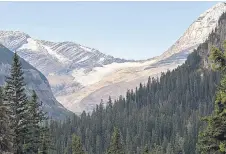  ?? ?? The Jackson Glacier, which has shrunk 40 per cent from 316 acres (128 hectares) down to 187 acres (76 hectares) as of 2015, viewed from the Jackson Glacier Overlook in Glacier National Park.