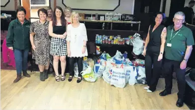  ??  ?? Giving something back Consultanc­y work with Slimming World sees people support great causes like Airdrie Foodbank