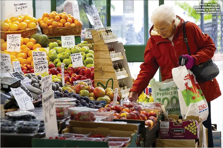  ?? Picture: MATTHEW HORWOOD/GETTY ?? Price we pay... many shoppers are having to look for cheaper products