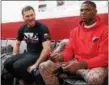  ?? TIM PHILLIS — THE NEWS-HERALD ?? Stipe Miocic and Browns receiver Josh Gordon chat after Miocic’s workout at Strong Style in Independen­ce on Dec. 21.