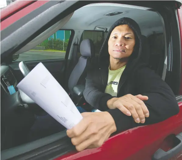  ?? Jason Payne/ PosTMeDIa ?? Surrey’s Reden Gangis, pictured in his 2007 Ford Escape, saved about $240 by cancelling his car insurance for two months during the pandemic. It turns out he’ll have to hand those savings right back, though, because his rates have shot up by roughly the same amount.