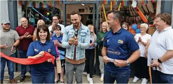  ?? ?? South African cricketer Faf Du Plessis, centre and right, meeting fans and Newlands Sports owners Amanda and Peter Kettle at their sports shop in County Durham