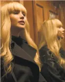  ?? Murray Close / Twentieth Century Fox ?? The camera captures the essence of Jennifer Lawrence’s character in “Red Sparrow.”