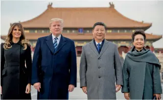  ?? — AP ?? US President Donald Trump, First Lady Melania Trump with Chinese President Xi Jinping and his wife Peng Liyuan during a visit to the Forbidden City in Beijing on Wednesday.