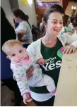  ??  ?? Julie O’Donoghue and her daughter Ailbhe (6 months) at a count centre in Roscommon. Photo: Steve Humphreys