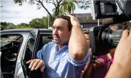  ?? Photograph: Aaron Bunch/AAP ?? Outback Wrangler star Matt Wright arrives at the Darwin local court on Wednesday after being charged with multiple offences relating to a helicopter crash.