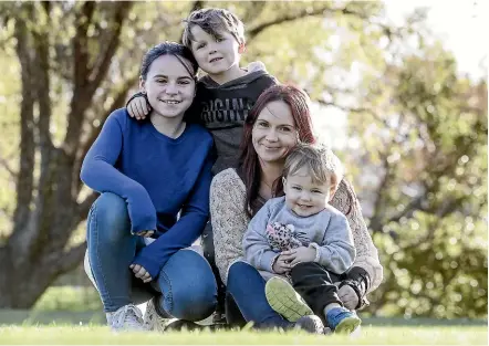  ?? STUFF ?? Rochelle Brown is a working solo mum, who was interviewe­d before the last Budget. She said they lived week to week. The Government will need to decide whether a taxfree threshold or tax credits would help her most.