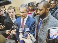  ?? AP PHOTO ?? FREE TO FLEE: Darrelle Revis (right) and his attorney meet the press yesterday after robbery and assault against the cornerback were dropped.