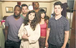  ?? ?? Above: Zooey Deschanel with the “New Girl” cast (from far left): Lamorne Morris, Jake Johnson, Damon Wayans, Hannah Simone and Max Greenfield.