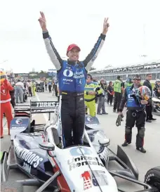  ?? CARLOS OSORIO, AP ?? Graham Rahal exults after winning Saturday in the first race of the IndyCar Detroit Grand Prix doublehead­er.