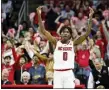  ?? KARL B DEBLAKER — ASSOCIATED PRESS ?? North Carolina State’s Terquavion Smith celebrates making a three-point shot against Duke in Raleigh, N.C., on Wednesday.