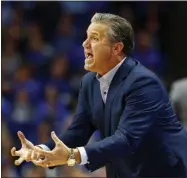  ?? JAMES CRISP - THE ASSOCIATED PRESS ?? Kentucky coach John Calipari urges his team on during the second half of an NCAA college basketball game against Evansville in Lexington, Ky., Tuesday, Nov. 12, 2019. Evansville won 67-64.