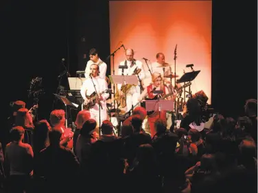  ?? Maria Baranov ?? Jason and the Argonauts, above, accompany themselves on film and Sol Koeraus, left, performs as part of “La Medea” at ODC Theater.