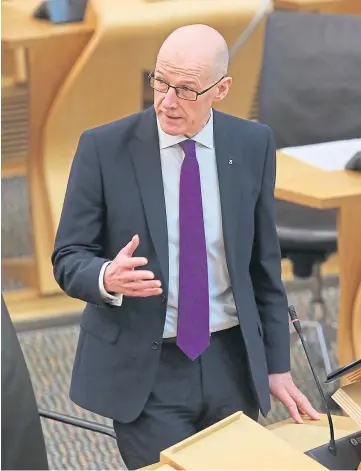  ??  ?? UNIVERSITI­ES: John Swinney said students’ return after Christmas could be staggered.