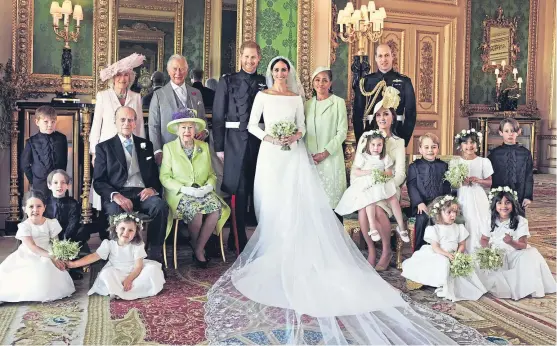  ?? Picture: Alexi Lubomirski. ?? The Duke and Duchess in the Green Drawing Room, Windsor Castle, with the Queen, Duke of Edinburgh, Prince of Wales, Duchess of Cornwall, the Duke and Duchess of Cambridge, the bride’s mother Doria Ragland and young bridesmaid­s and pageboys.