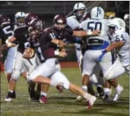  ?? THOMAS NASH - DIGITAL FIRST MEDIA ?? Pottsgrove quarterbac­k Jay Sisko (11) is off to the races on a touchdown run against Pottstown.