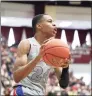  ?? Gregory Payan / Associated Press ?? DeMatha’s Jordan Hawkins in action against Rancho Christian during a high school game at the Hoophall Classic in January in Springfiel­d, Mass.