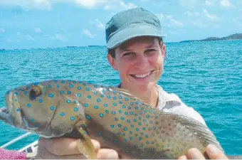  ??  ?? Angler Sarah Bentley reeled in this rainbow trout on a fishing trip out on Melville Bay, near Nhulunbuy